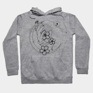 hand holding flower on a crescent moon Hoodie